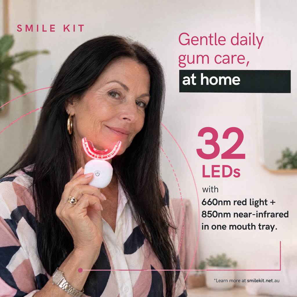 Woman holding Oral Red Light device, 32 LEDs